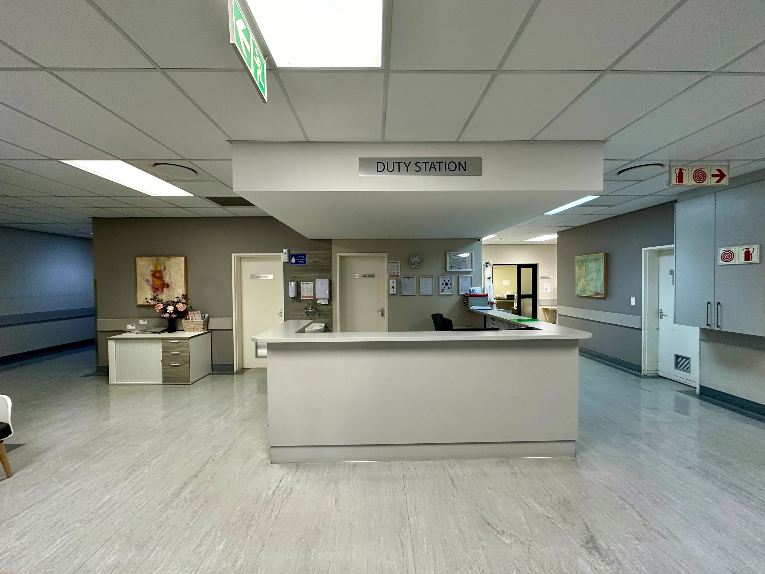 Clinic reception desk representing administrative operations